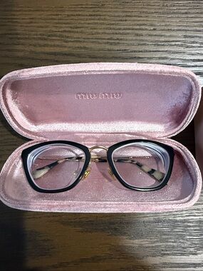 Miu Miu Black and Gold Cat-Eye Glasses with Pink Velvet Case